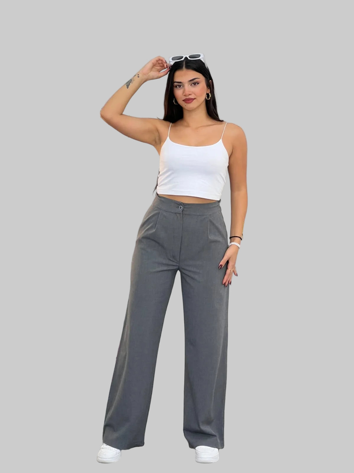 Raka byxor med knappar framtill för dam